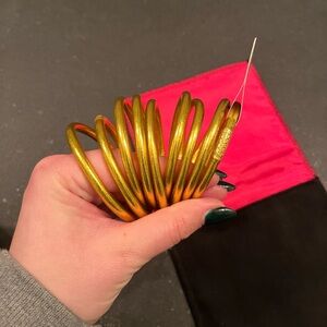 Budha Girl gold bangles set of 9